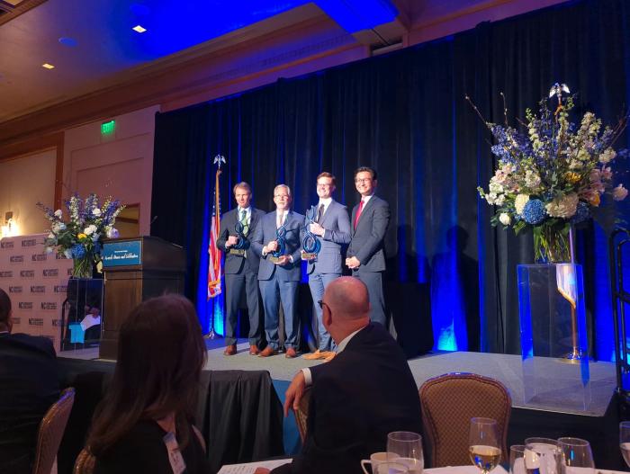 From left, Durham Tech President J.B. Buxton, Wake Tech President Scott Ralls, Senior Director of Human Resources at Lilly RTP Joe Owen and Economic Development Partnership Chief Executive Officer Chris Chung at the Pinnacle Awards ceremony.