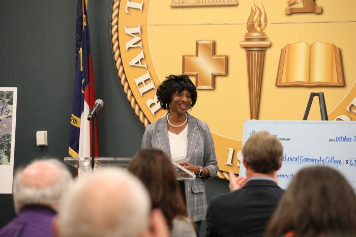 U.S. Rep. Valerie Foushee announces federal funding that will assist with Durham Tech's affordable housing initiative.