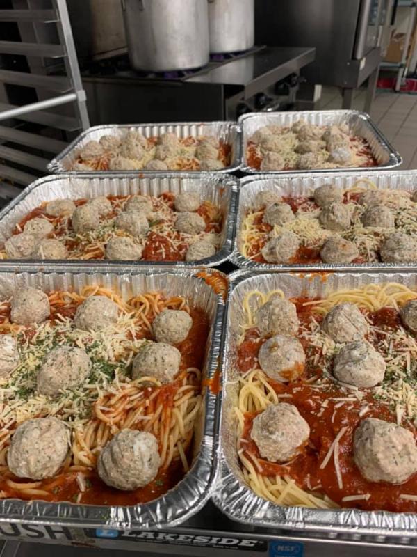 several frozen meals of spaghetti and meatballs
