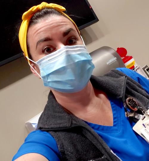 selfie of nurse wearing a face mask 