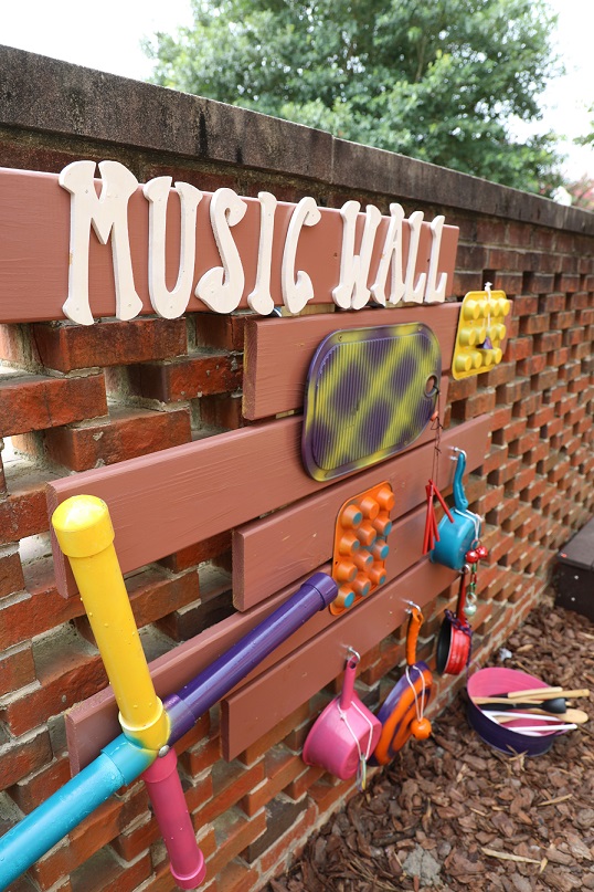 close up of music wall with household instruments