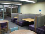 A photograph showing the booths in the downstairs study area of the library