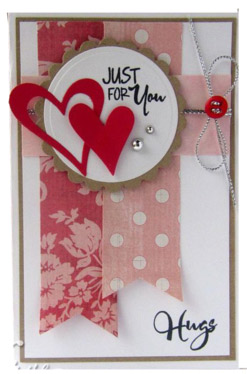 hand-crafted valentines card with just for you and hugs and images of hearts