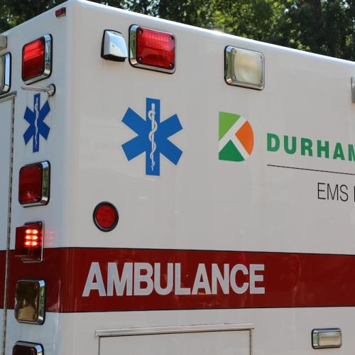 An image of the side and back of a Durham Tech branded ambulance with the words "EMS Education" on the side of it.